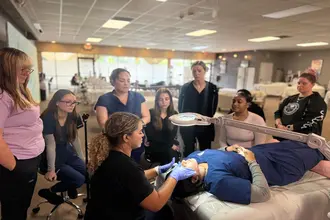 Intensive aesthetician clinical training session at FAMA Academy campus